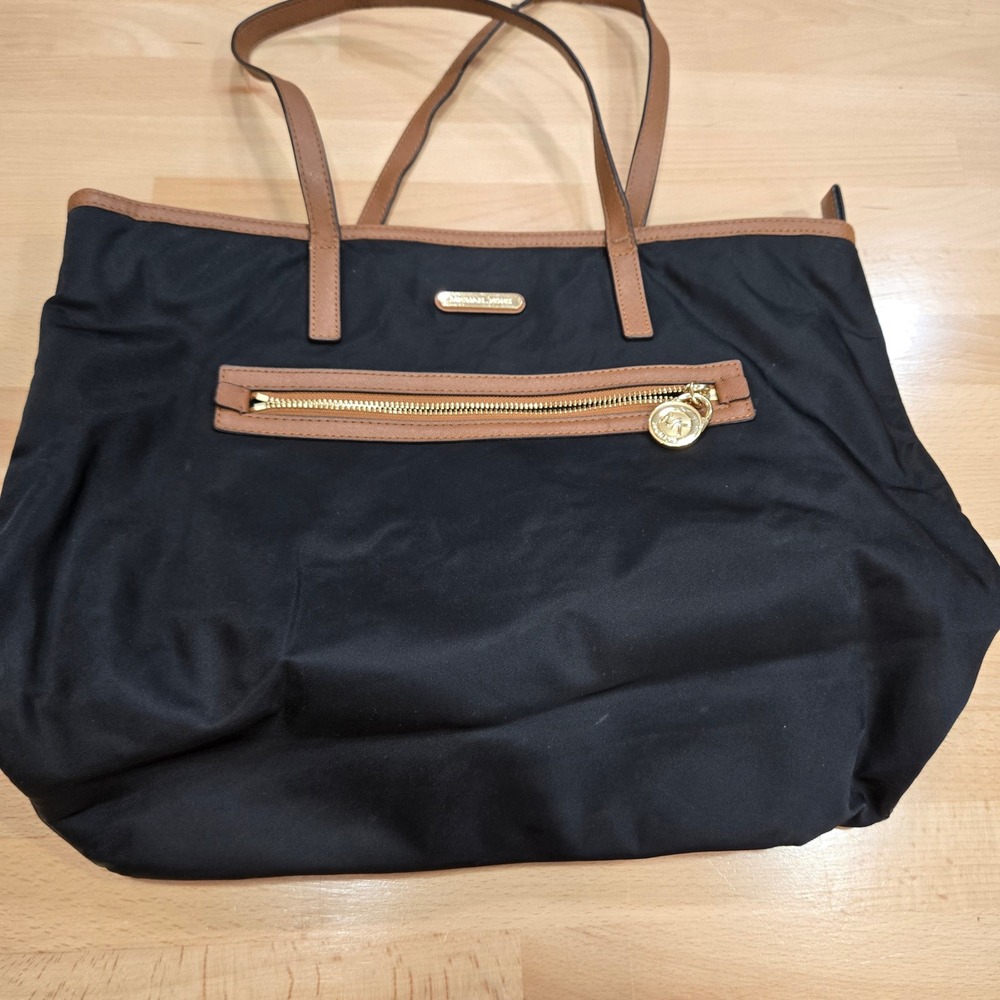 Michael Kors Black Tote Bag with Brown Trim and Gold Hardware